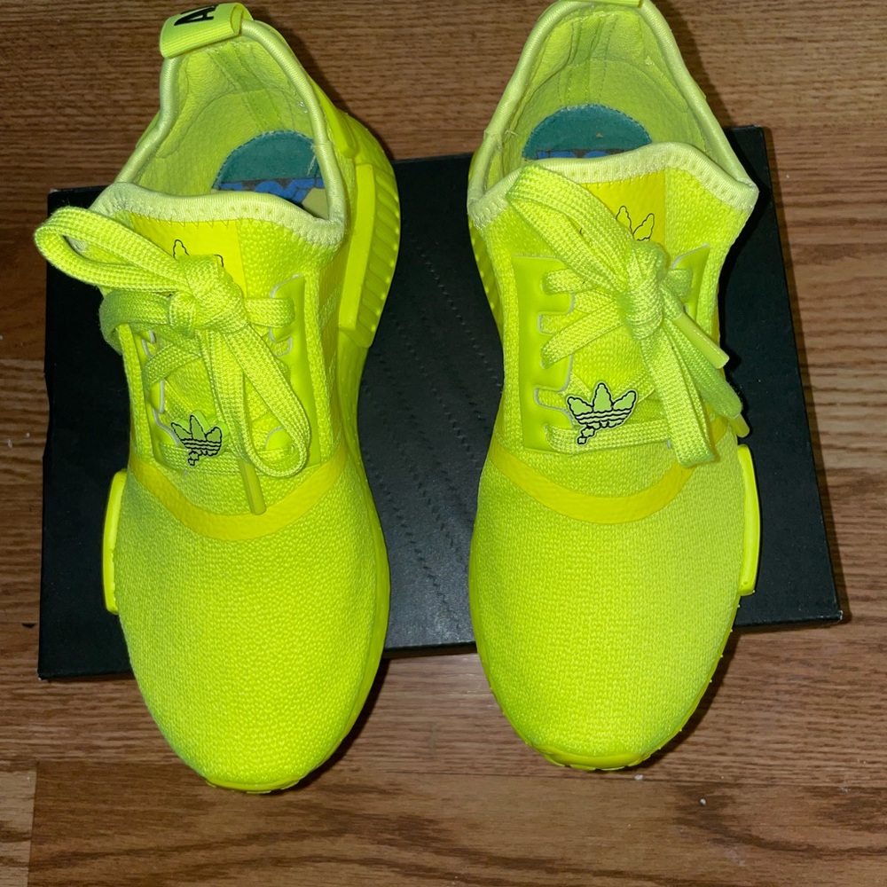 Brand new Adidas size 5W. Only wore them once. Comes in original box.